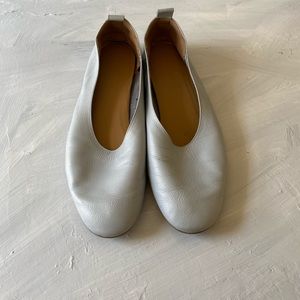 Everlane: Sky blue flats.